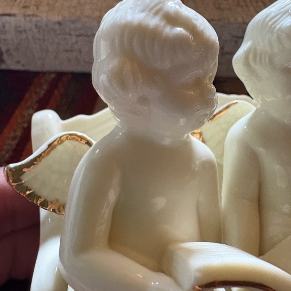 Vintage Porcelain Angel Figurine Two
Angels Sitting On a Bench - Picture 6 of 12